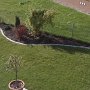 Garden (robot lawn mower in corner)
